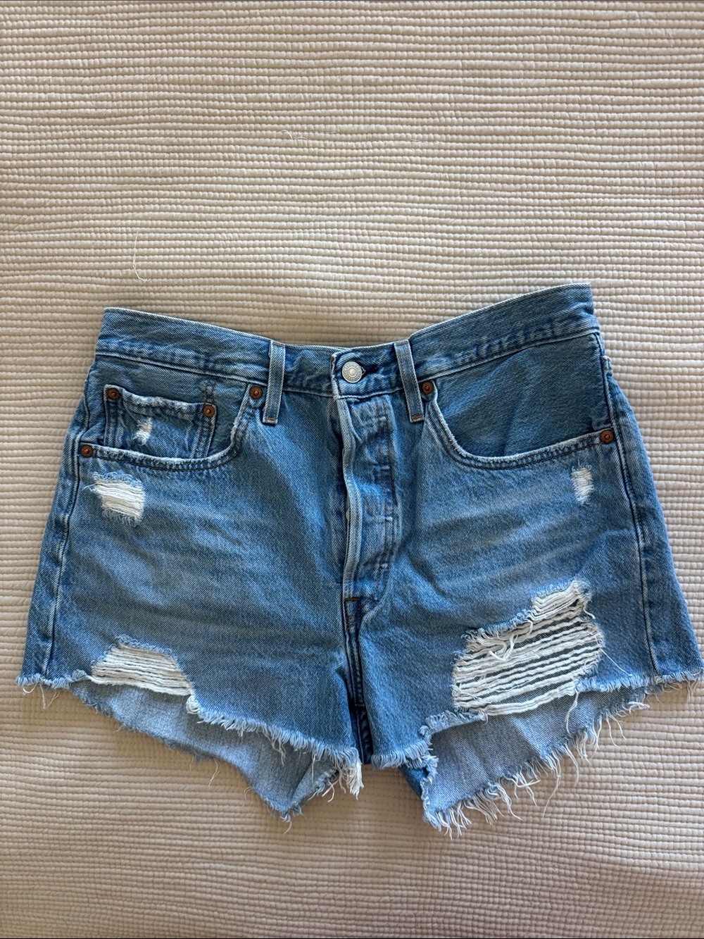 Levi’s distressed cut off denim shorts